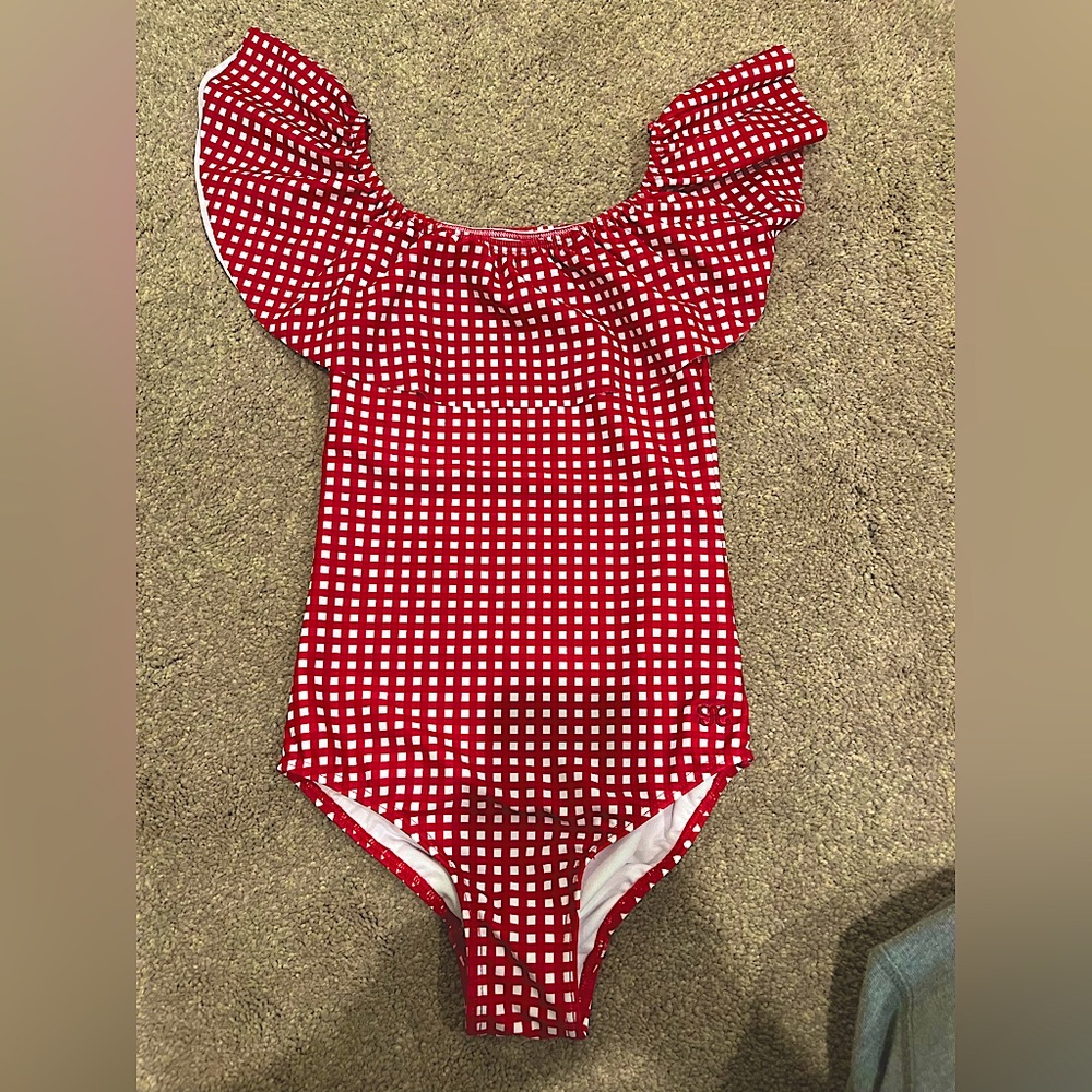 Brand new Albion fit child’s swimming suit. Size 8-9.